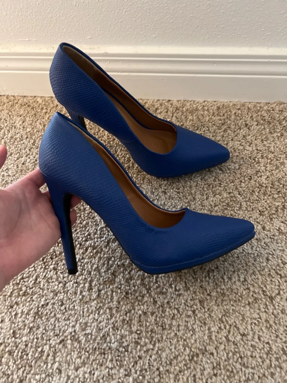 Blue textured stiletto heels